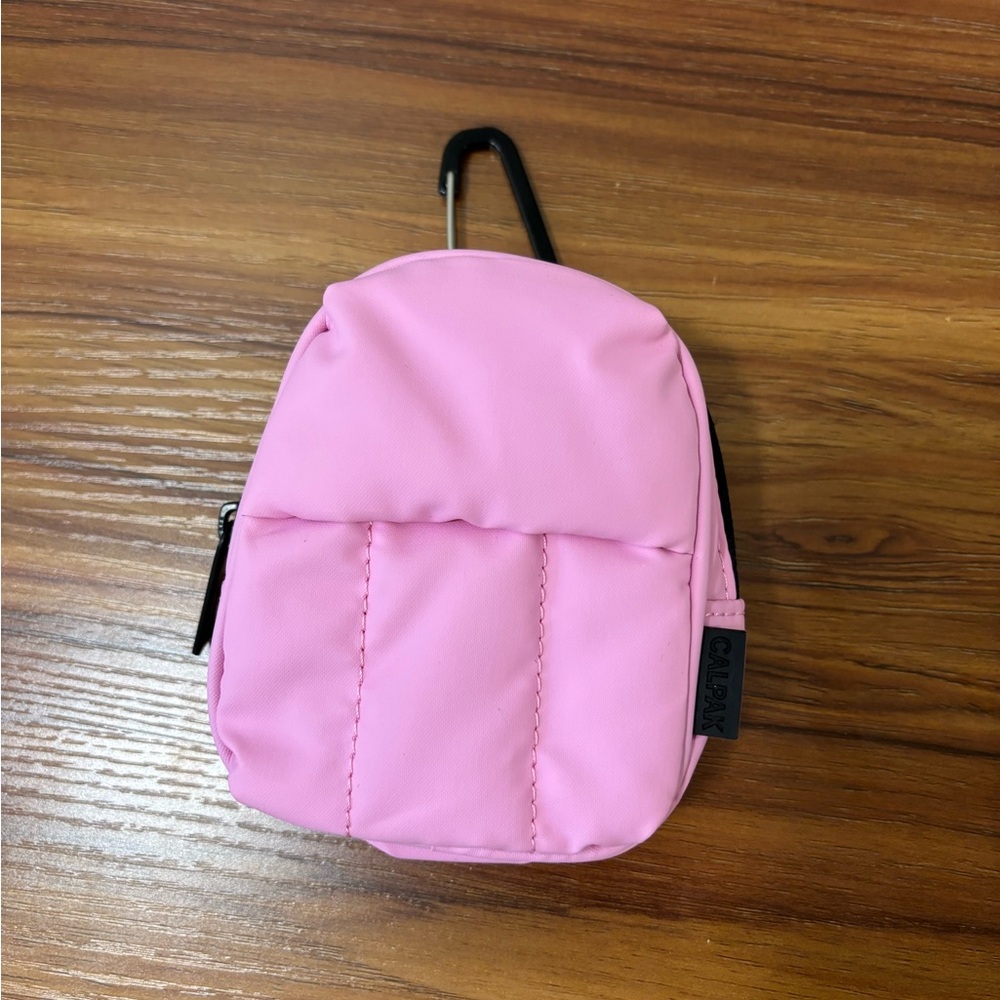 Calpak Luka backpack key pouch in pink